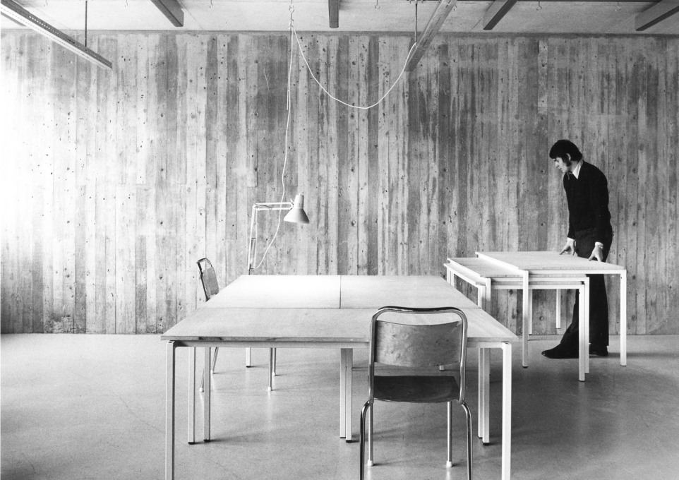 The project&rsquo;s young interior architect, Bror Martin Nilsson, demonstrates the stackable drawing tables of his design. (Photo: Sten Vilson, 1970)