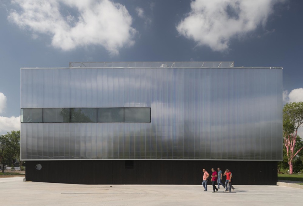 ...allowing OMA to install striking new features, such as the translucent polycarbonate fa&ccedil;ade.